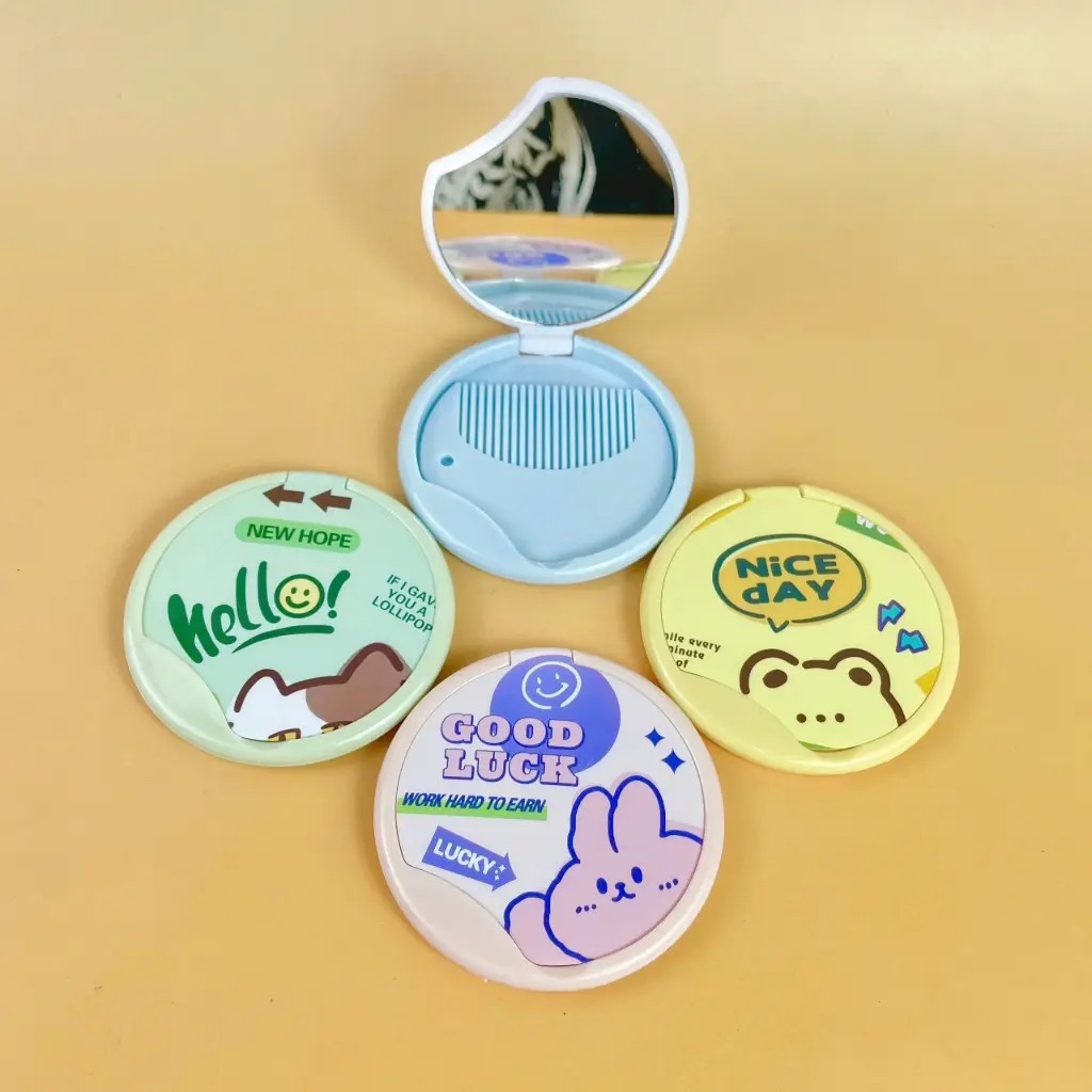 gương kèm lược tròn